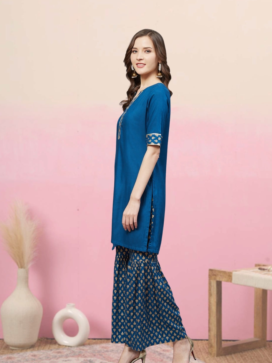 women rayon gold printed straight kurta sharara set blue
