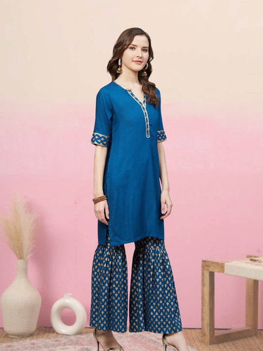 women rayon gold printed straight kurta sharara set blue